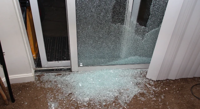 Cracked sliding glass door panel needing replacement